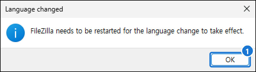 Language changed 안내 창. 언어를 적용하려면 FileZilla를 다시 시작해야 한다는 내용